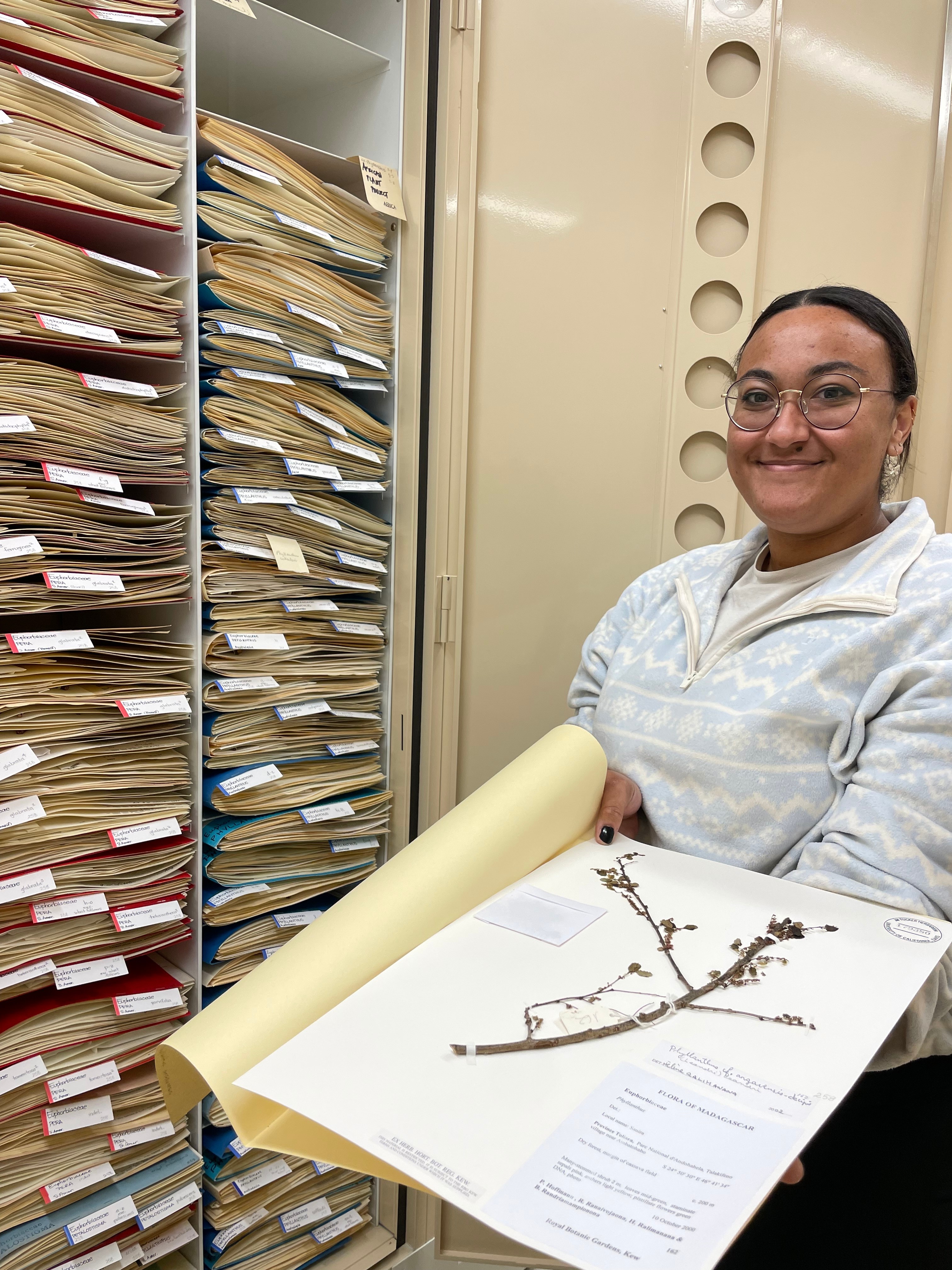 Morgan holding a specimen from Madagascar